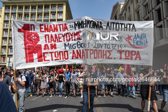 Protesters shout slogans during a rally commemorating May Day in Athens, Greece May 1, 2018. 