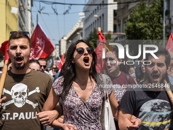 Protesters shout slogans during a rally commemorating May Day in Athens, Greece May 1, 2018. (