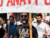 Protesters shout slogans during a rally commemorating May Day in Athens, Greece May 1, 2018. (