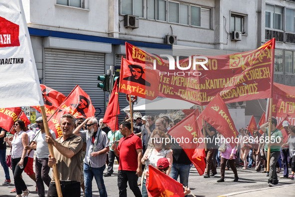 Protesters shout slogans during a rally commemorating May Day in Athens, Greece May 1, 2018. 