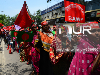 Bangladeshi garment workers and other labor organization members take part in a rally to mark May Day, International Workers' Day in Dhaka,...