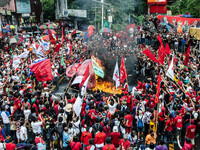 Protesters watch the effigy of President Rodrigo Duterte burn. Thousands of activists attend the Labor Day Protest in Mendiola street, Manil...