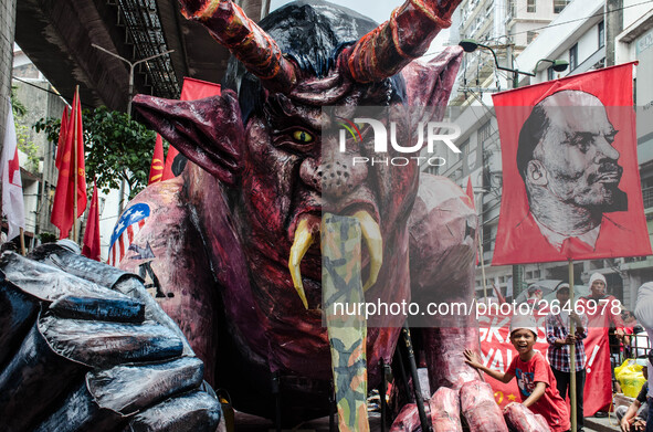 For the 2018 Labor Day Protest, the makers of the effigy portrayed President Rodrigo Duterte as a monster with horns, fangs, long tongue, an...