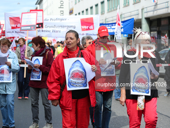 Women singing against 'profitsharks in the care sector'. Several thousands followed the invitation of the trade unions such as IG Metall, Ve...