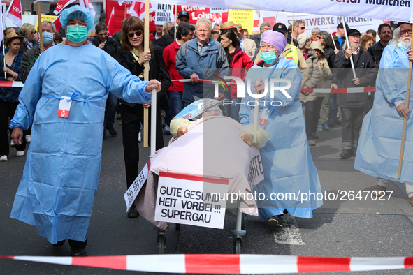 Activists making aware of the heavy problems in the health industry. Several thousands followed the invitation of the trade unions such as I...