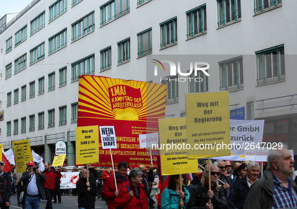 ommunists with a huge banner. Several thousands followed the invitation of the trade unions such as IG Metall, Verdi, GEW and others to prot...