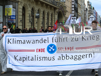 Activists of Ende Gelaende with a banner against Capitalism, climate change and war. Several thousands followed the invitation of the trade...