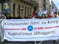 Activists of Ende Gelaende with a banner against Capitalism, climate change and war. Several thousands followed the invitation of the trade...