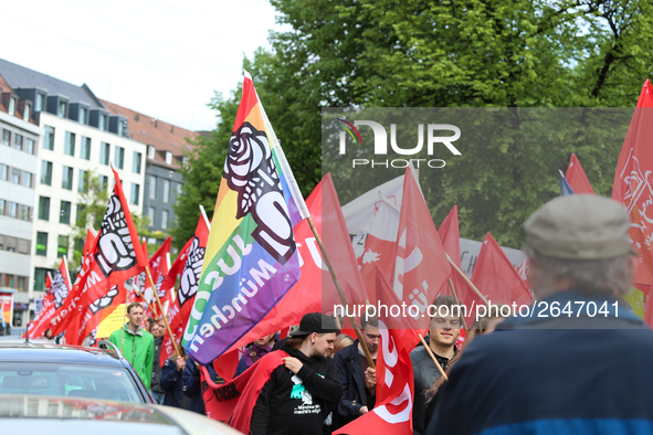 JuSos-flags. Several thousands followed the invitation of the trade unions such as IG Metall, Verdi, GEW and others to protest at the intern...