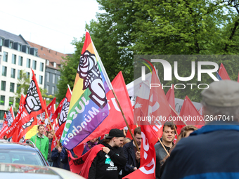 JuSos-flags. Several thousands followed the invitation of the trade unions such as IG Metall, Verdi, GEW and others to protest at the intern...