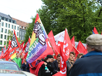 JuSos-flags. Several thousands followed the invitation of the trade unions such as IG Metall, Verdi, GEW and others to protest at the intern...