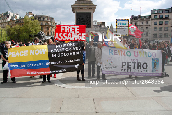 Mayday Marchers call to free Julian Assange . International Workers Day in London kicked off with a march through Central London and ended i...