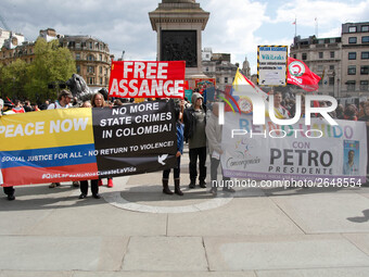 Mayday Marchers call to free Julian Assange . International Workers Day in London kicked off with a march through Central London and ended i...