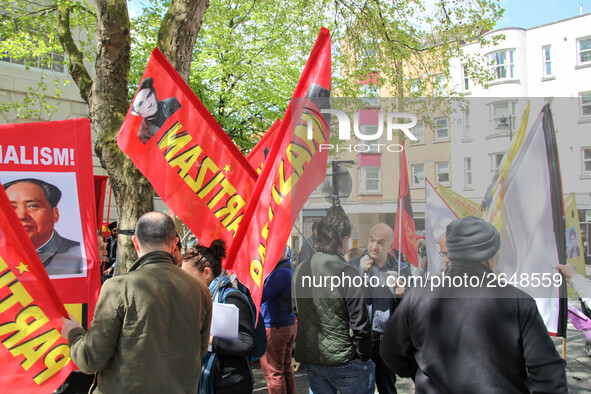 Partizan Flags at Mayday In London. International Workers Day in London kicked off with a march through Central London and ended in Trafalga...