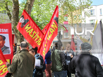 Partizan Flags at Mayday In London. International Workers Day in London kicked off with a march through Central London and ended in Trafalga...