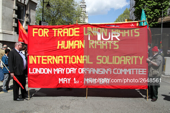 Banner at Mayday . International Workers Day in London kicked off with a march through Central London and ended in Trafalgar Square where th...