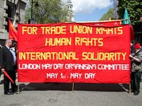 Banner at Mayday . International Workers Day in London kicked off with a march through Central London and ended in Trafalgar Square where th...