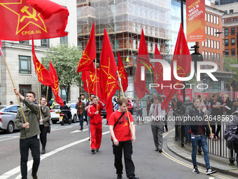 Communist Party of Great Britain (Marxist-Leninist) at Mayday . International Workers Day in London kicked off with a march through Central...