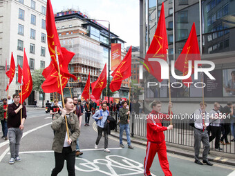 Communist Party of Great Britain (Marxist-Leninist) at Mayday . International Workers Day in London kicked off with a march through Central...