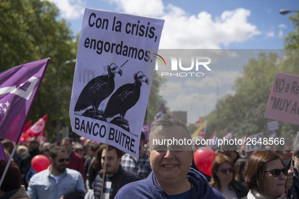 Thousands of people have marched on May Day in Madrid, under the slogan "Time to win: Equality, better employment, higher wages and decent p...