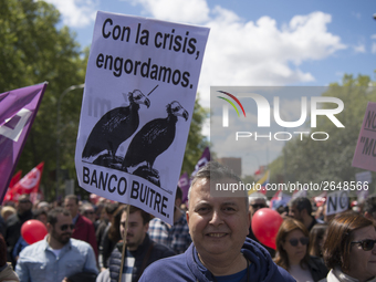 Thousands of people have marched on May Day in Madrid, under the slogan "Time to win: Equality, better employment, higher wages and decent p...