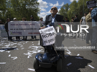 Thousands of people have marched on May Day in Madrid, under the slogan "Time to win: Equality, better employment, higher wages and decent p...