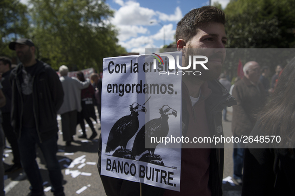 Thousands of people have marched on May Day in Madrid, under the slogan "Time to win: Equality, better employment, higher wages and decent p...