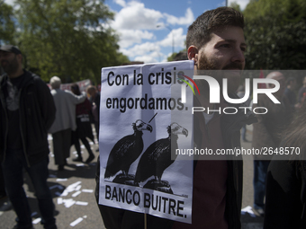 Thousands of people have marched on May Day in Madrid, under the slogan "Time to win: Equality, better employment, higher wages and decent p...