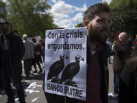 Thousands of people have marched on May Day in Madrid, under the slogan "Time to win: Equality, better employment, higher wages and decent p...