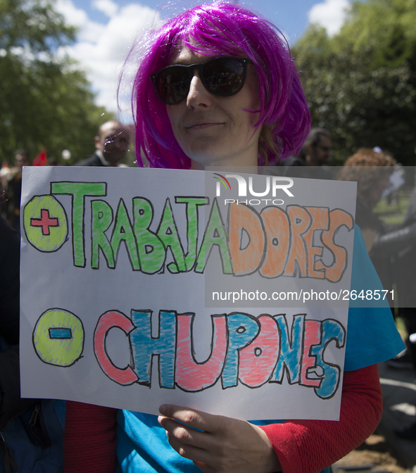 Thousands of people have marched on May Day in Madrid, under the slogan "Time to win: Equality, better employment, higher wages and decent p...