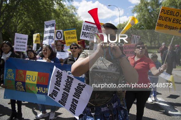 Thousands of people have marched on May Day in Madrid, under the slogan "Time to win: Equality, better employment, higher wages and decent p...