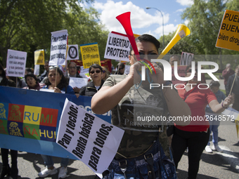 Thousands of people have marched on May Day in Madrid, under the slogan "Time to win: Equality, better employment, higher wages and decent p...