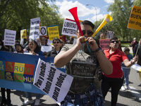 Thousands of people have marched on May Day in Madrid, under the slogan "Time to win: Equality, better employment, higher wages and decent p...