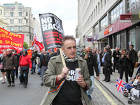 Marcher at Mayday in London . International Workers Day in London kicked off with a march through Central London and ended in Trafalgar Squa...