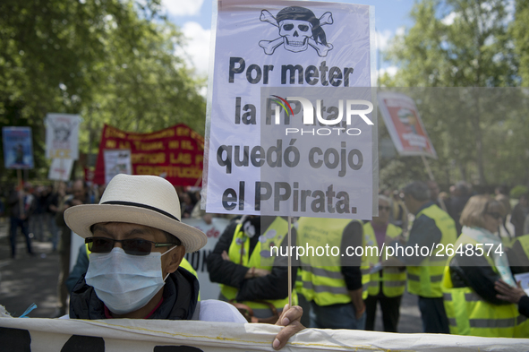 Thousands of people have marched on May Day in Madrid, under the slogan "Time to win: Equality, better employment, higher wages and decent p...