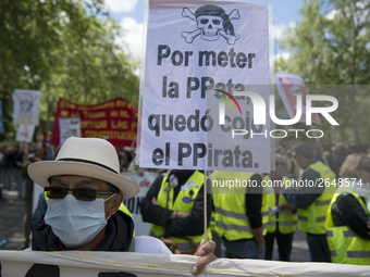 Thousands of people have marched on May Day in Madrid, under the slogan "Time to win: Equality, better employment, higher wages and decent p...