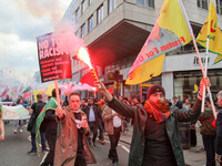 Kurdish protesters set off Flares at Mayday . International Workers Day in London kicked off with a march through Central London and ended i...