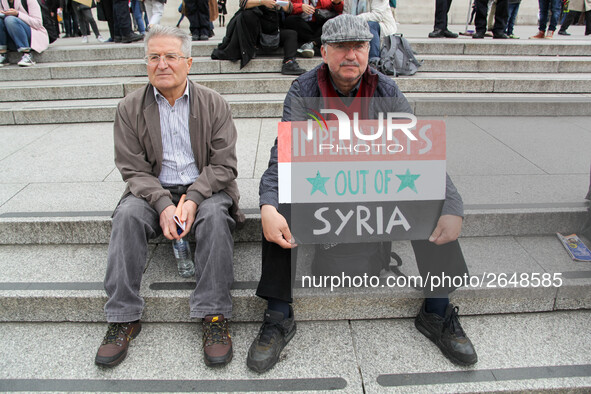 Mayday Marchers calls for Imperialists to Leave Syria . International Workers Day in London kicked off with a march through Central London a...