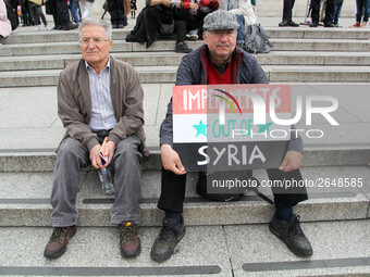 Mayday Marchers calls for Imperialists to Leave Syria . International Workers Day in London kicked off with a march through Central London a...