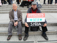 Mayday Marchers calls for Imperialists to Leave Syria . International Workers Day in London kicked off with a march through Central London a...