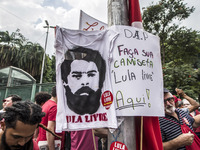 Supporters of the Workers' Party founder and Brazilian ex-president (2003-2011) Luiz Inacio Lula da Silva take part in a May Day rally at Re...