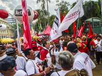 Supporters of the Workers' Party founder and Brazilian ex-president (2003-2011) Luiz Inacio Lula da Silva take part in a May Day rally at Re...