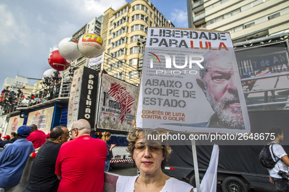 Supporters of the Workers' Party founder and Brazilian ex-president (2003-2011) Luiz Inacio Lula da Silva take part in a May Day rally at Re...