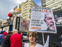 Supporters of the Workers' Party founder and Brazilian ex-president (2003-2011) Luiz Inacio Lula da Silva take part in a May Day rally at Re...