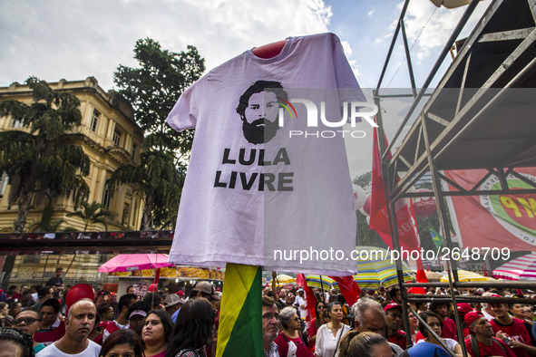 Supporters of the Workers' Party founder and Brazilian ex-president (2003-2011) Luiz Inacio Lula da Silva take part in a May Day rally at Re...