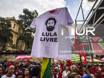 Supporters of the Workers' Party founder and Brazilian ex-president (2003-2011) Luiz Inacio Lula da Silva take part in a May Day rally at Re...