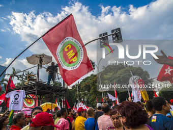 Supporters of the Workers' Party founder and Brazilian ex-president (2003-2011) Luiz Inacio Lula da Silva take part in a May Day rally at Re...