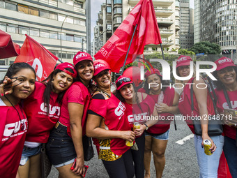 Supporters of the Workers' Party founder and Brazilian ex-president (2003-2011) Luiz Inacio Lula da Silva take part in a May Day rally at Re...