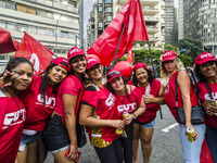 Supporters of the Workers' Party founder and Brazilian ex-president (2003-2011) Luiz Inacio Lula da Silva take part in a May Day rally at Re...