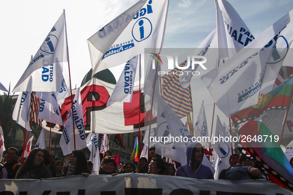 Chilean workers take part in a May Day march in Santiago on May 1, 2018. 